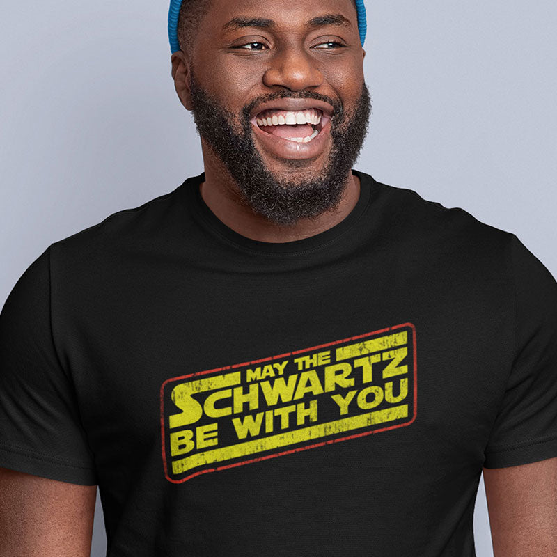 distressed 80s tees featuring the words May the schwartz be with you.