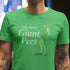 Man in t shirt. Green offensive tee shirt with giant pees graphic.