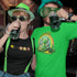 Couple wearing St Patricks day t shirts by Dodo Tees