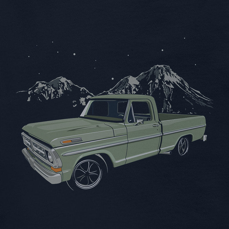 detail view of classic truck t shirt by dodo tees with illustration of a truck in front of mountains and stars