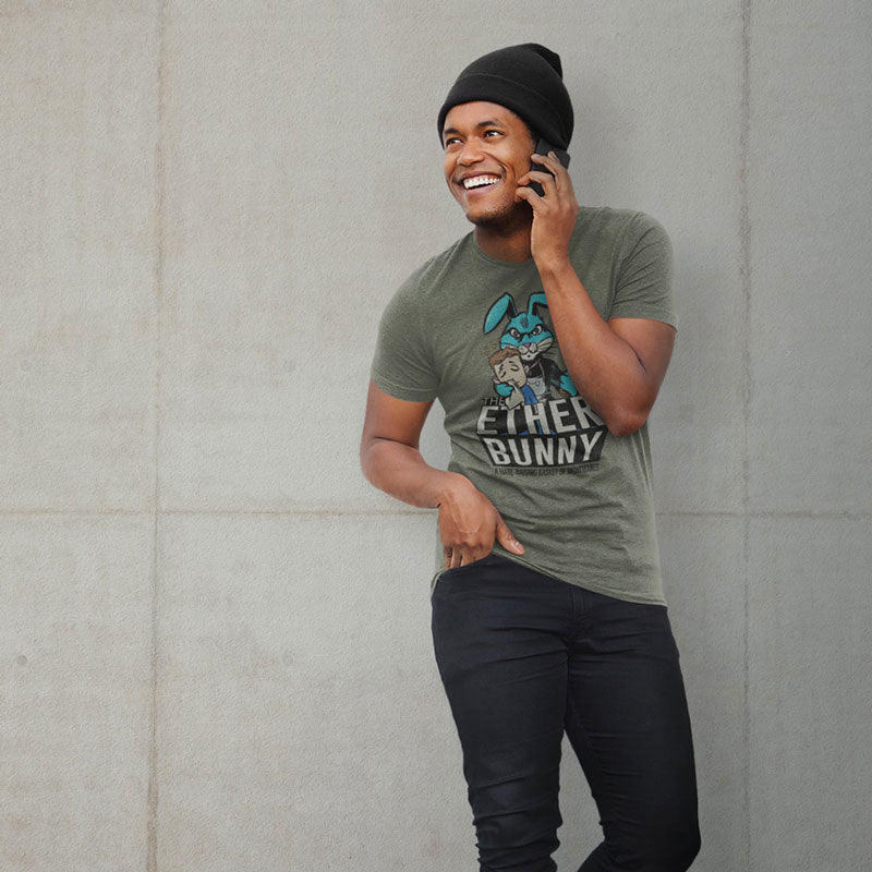 smiling man on phone wearing easter graphic shirt with ether bunny illustration
