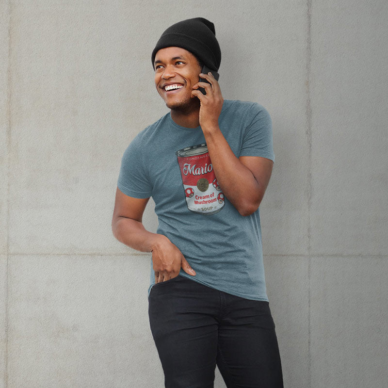 Guy wearing Heather Blue gamer T-Shirt. A Stylish Pop Culture Mashup from Dodo Tees.