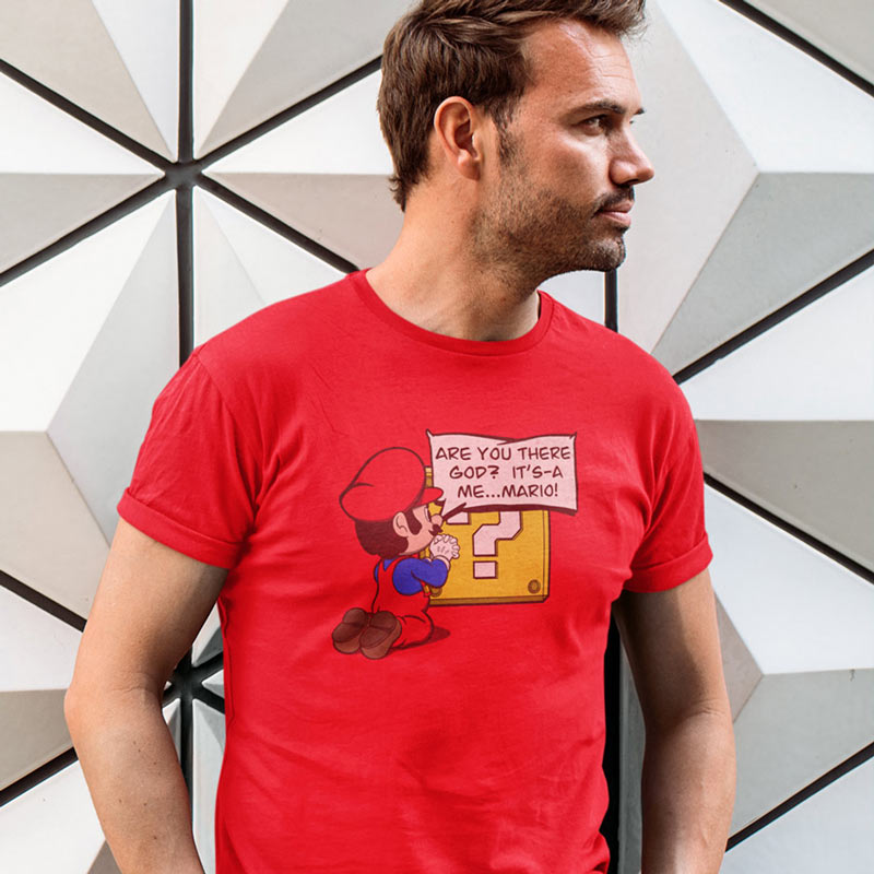Gift for gamer t shirt where mario is on his knees asking Are you there god it's a me mario. Design by Dodo Tees.