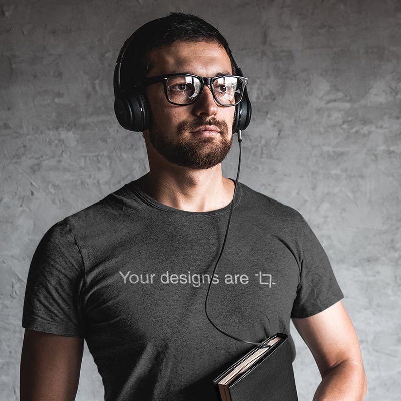 man with headphones wearing graphic designer tshirt with your designs are crop typography