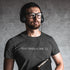 man with headphones wearing graphic designer tshirt with your designs are crop typography