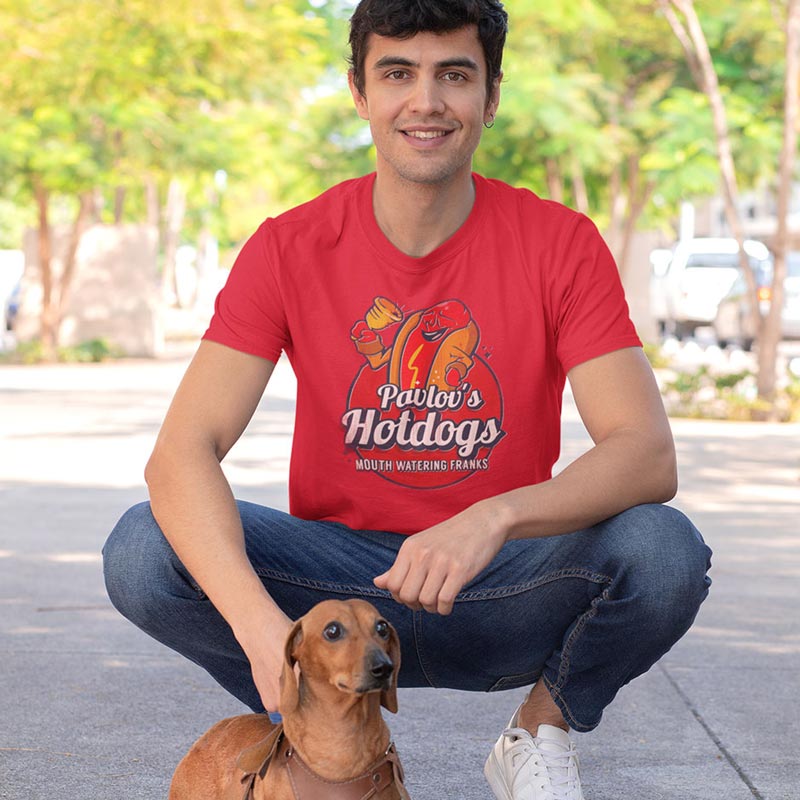 Man with dachshund dog wearing science shirt with pavlovs hot dogs funny restaurant logo in red