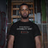 Detailed photo of the Stealth Wear Invisibility Shirt: Power Low Novelty Shirt in black by Dodo Tees