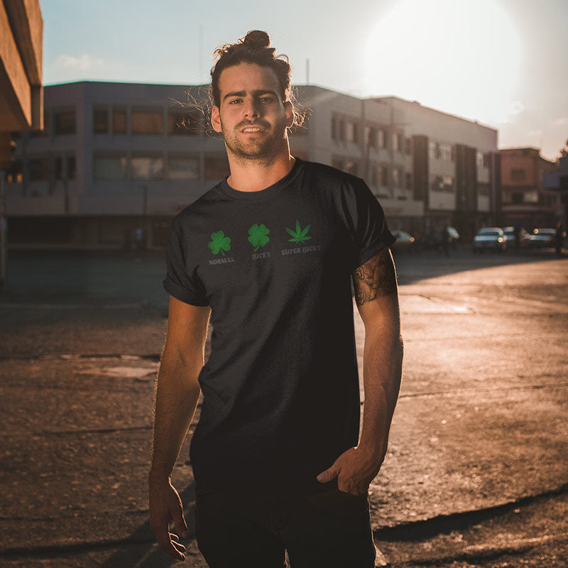Man wearing st patricks day shirt with marijuana leaf