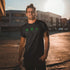 Man wearing st patricks day shirt with marijuana leaf