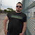 man leaning against fence wearing white elephant gifts exotic coffee for men t shirt by dodo tees