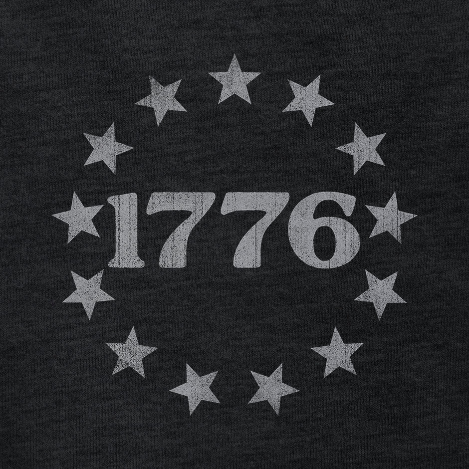 1776 4th of july shirt by dodo tees. The patriotic shirts have thirteen stars encircle that sacred year signifying the Thirteen Colonies. 