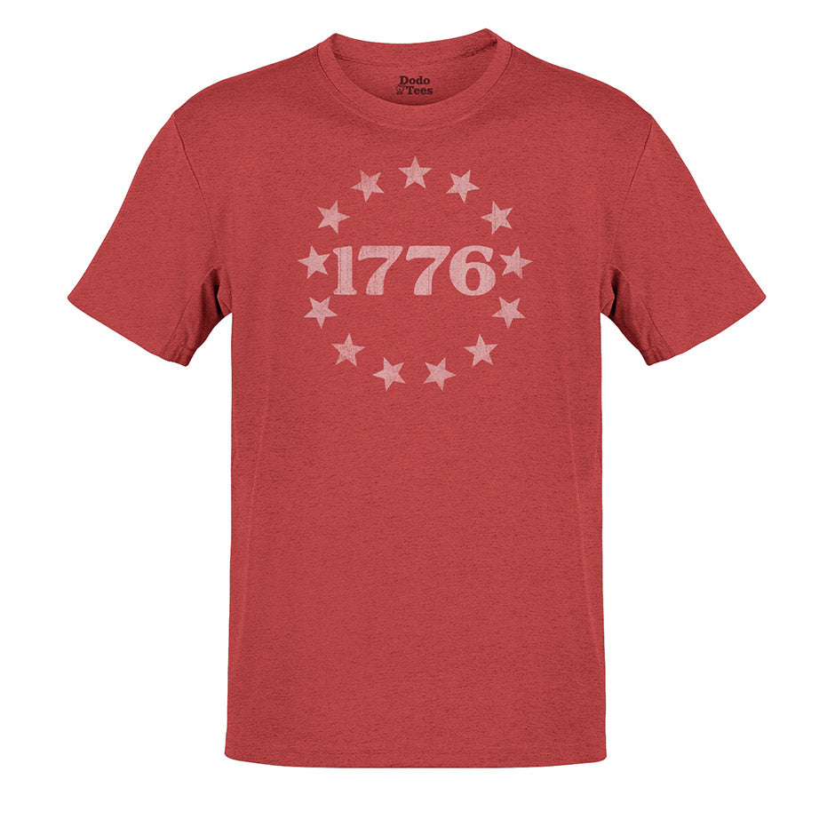 4th of july shirt with 1776 graphic in heather canvas red by dodo tees. The 1776 t shirt is crafted with a buttery soft texture and tailored with side seams for a modern fit.