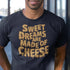 close up of man wearing 80s t shirt with sweet dreams are made of cheese typography