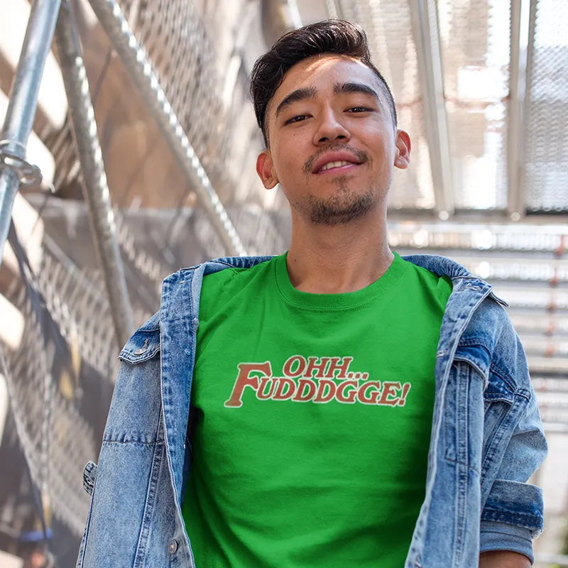 smiling man wearing 80s tee with oh fudge typography by dodo tees