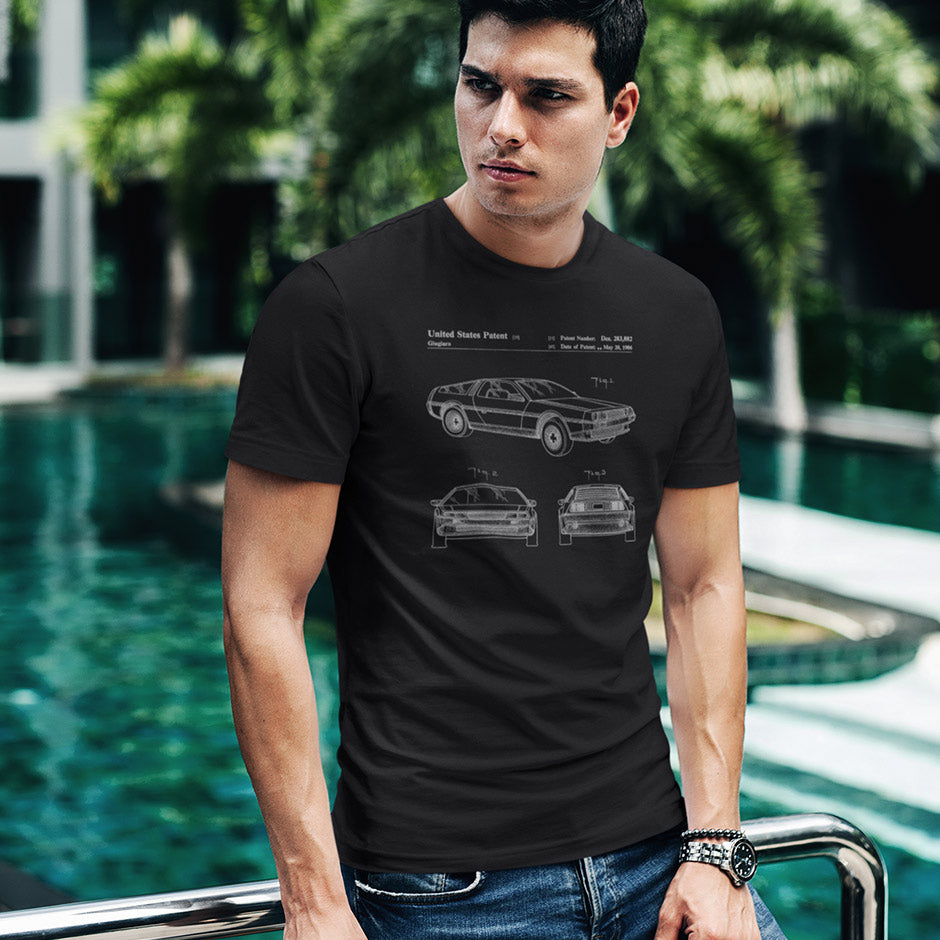 Guy wearing the Dodo Tees BTTF shirt featuring the DMC 12 car patent. The car graphic tee is printed using premium inks and materials to bring the legendary DMC-12 to life.