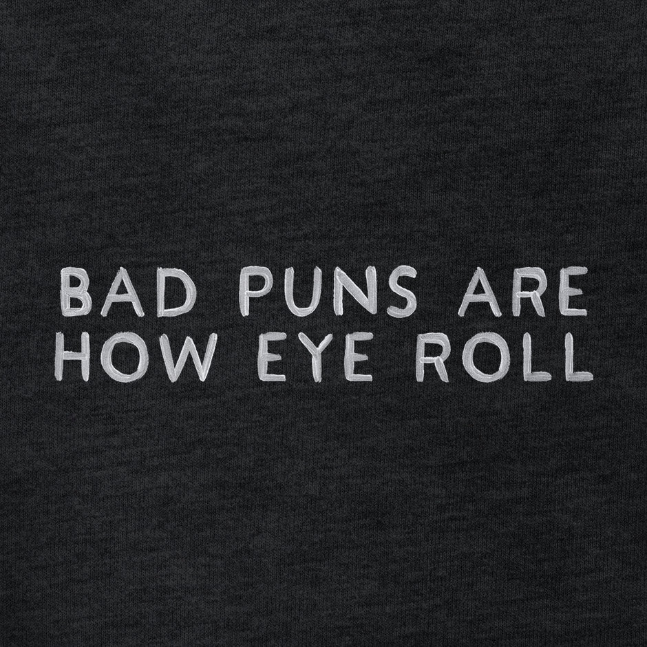 Pun Shirts with the words Bad Puns Are How Eye Roll. The Dad T Shirts feature hand written font.