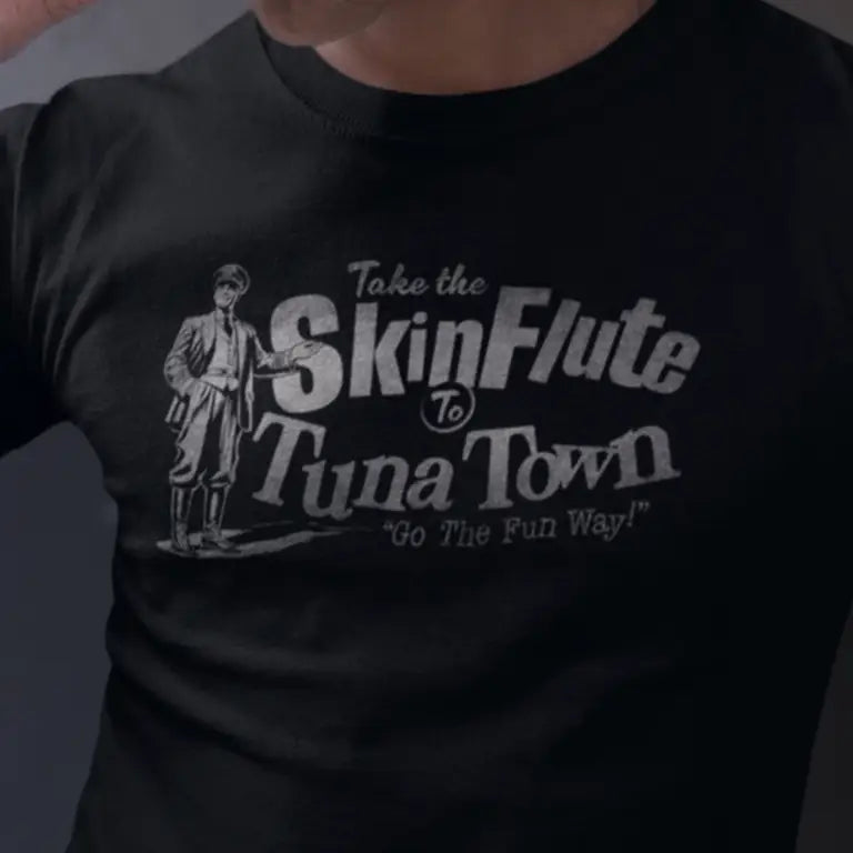 cool dirty santa gift for guys featuring the words take the skin flute to tuna town. 