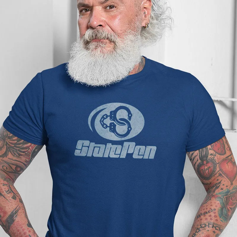 bearded man wearing humorous tee shirt with state pen graphic