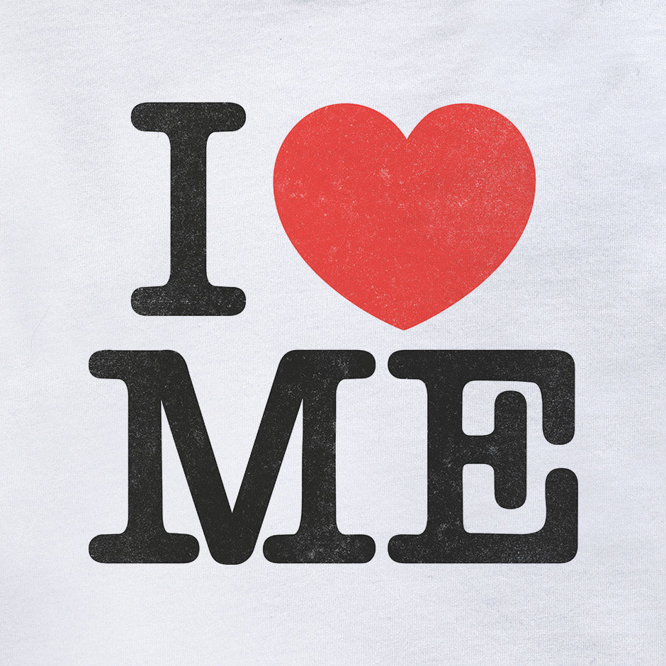 I love me shirt featuring black type and a red heart on white fabric. The sarcastic tees have a distressed printing style 