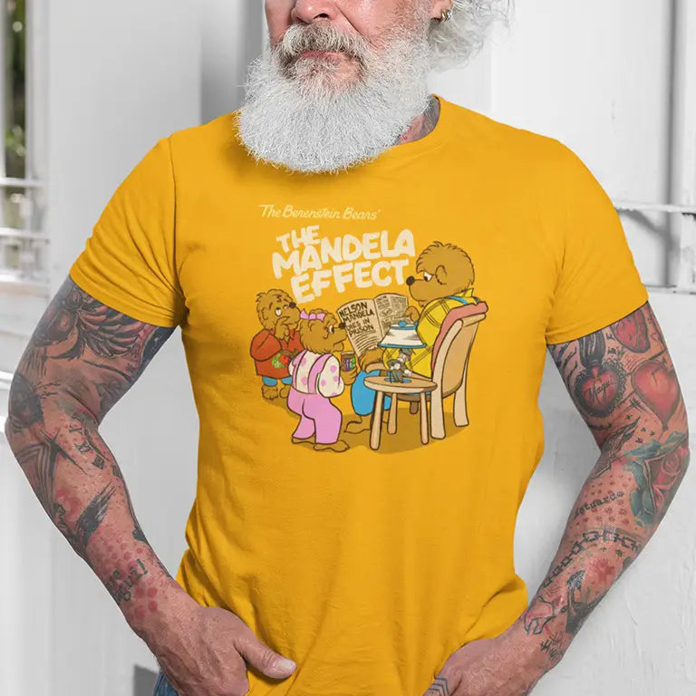 man wearing the Mandela Effect nerd shirt with the Berenstein Bears experiencing the phenomena