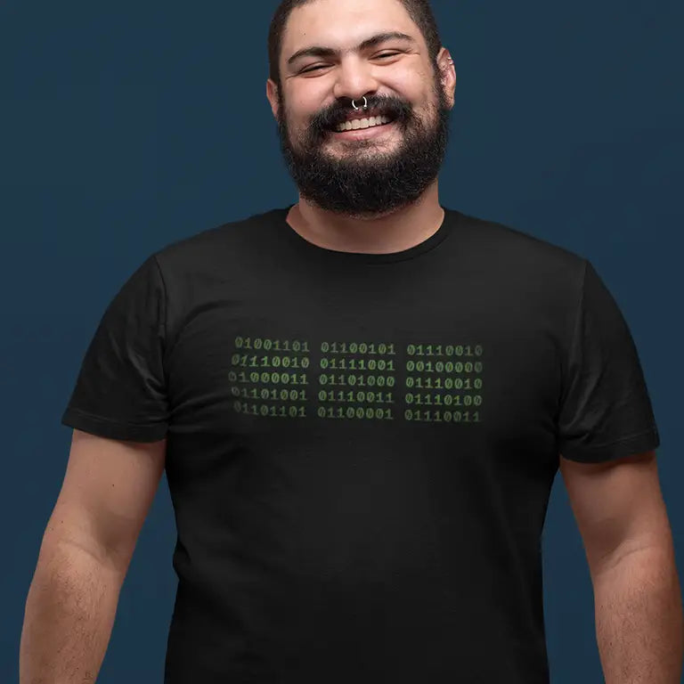 man wearing a Nerd shirt reading Merry Christmas in Binary Language