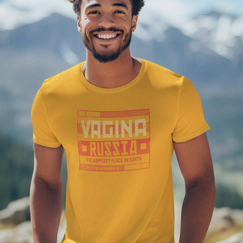 smiling man wearing offensive tee shirts by Dodo Tees. The Vagina Russia Premium Dirty T Shirts Are Buttery Soft.