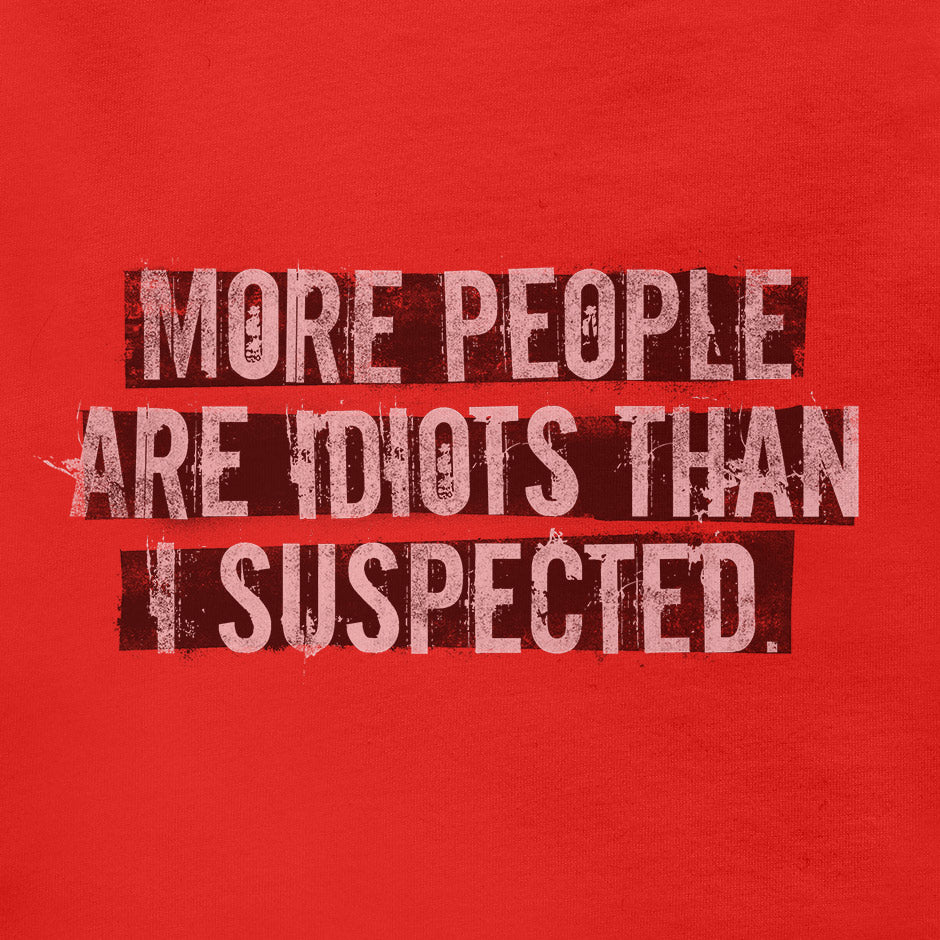 Offensive t shirt design that reads More People Are Idiots than I Suspected. The Funny Graphic Tees feature a Design by Dodo Tees  that mixes rough textures and flat colors.