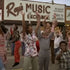 Vintage image of the Rays music exchange with a crowd of people dancing to shake your tail feather.