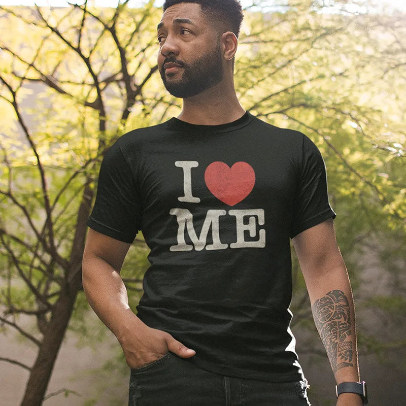 man in park wearing sarcastic tee with i love me typography