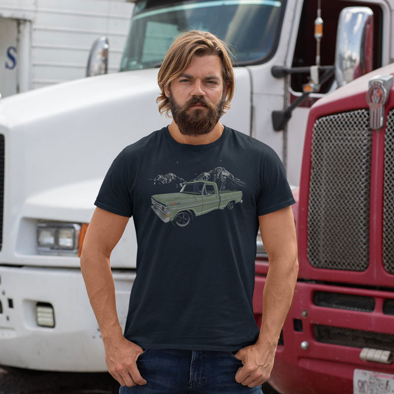 trucker wearing automotive apparel t shirt with illustration of classic pickup truck