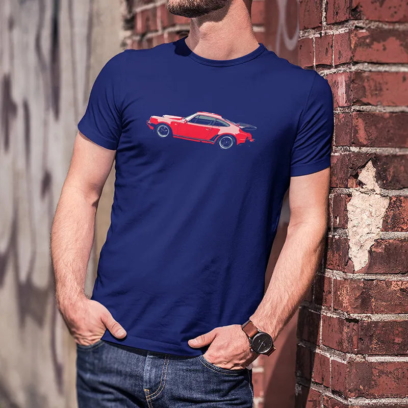 model leaning against wall wearing automotive apparel with 911 turbo