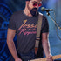 Guy playing guitar wearing a Dodo Tees band shirts featuring the fictional Jesse and Rippers Logo.