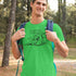 man in woods wearing camping gifts for men bigfoot t shirt in green