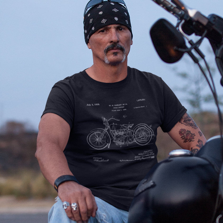 Man wearing the Dodo Tees Harley shirts for men with a 1928 patent. The motorcycle shirts are an ideal gift for dad. 