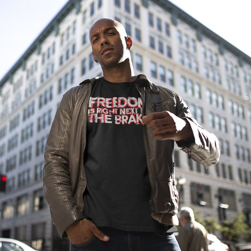 man outside wearing leather jacket and car guy gift freedom is right next to the brake t shirt