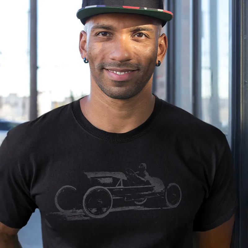 smiling man wearing car shirt with indy car grunge graphic