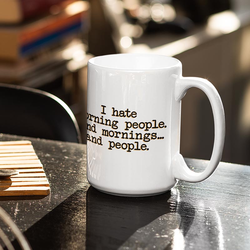 cat lover gifts mug on table with text that reads i hate morning people. and mornings...and people