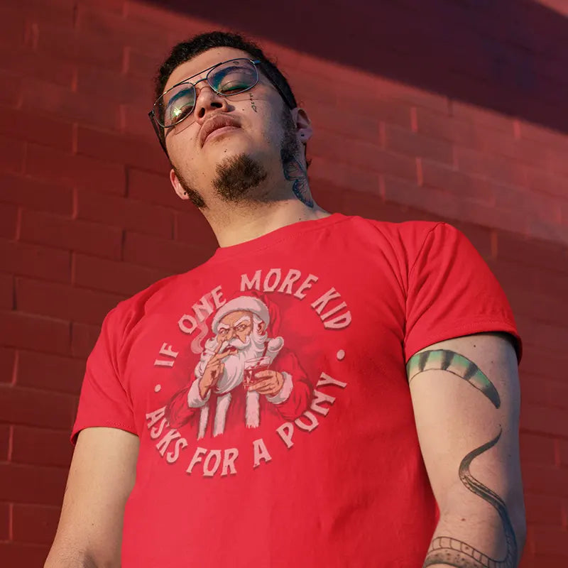 man wearing christmas shirt with angry santa