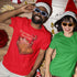 laughing people at party wearing christmas tees with seasons beatings design