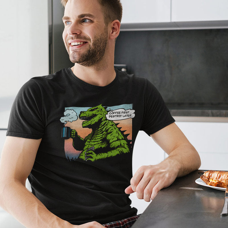  guy modeling coffee lover gifts. This coffee tshirt features a godzilla like monster drinking coffee by Dodo Tees.