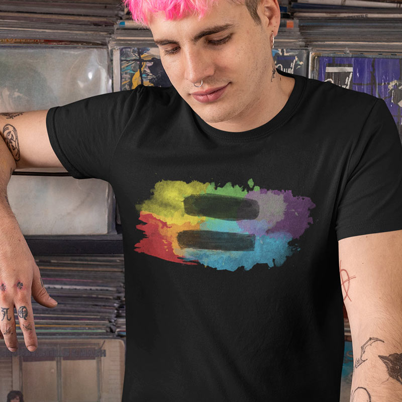 man wearing equality apparel with colorful watercolor equal sign graphic at record store