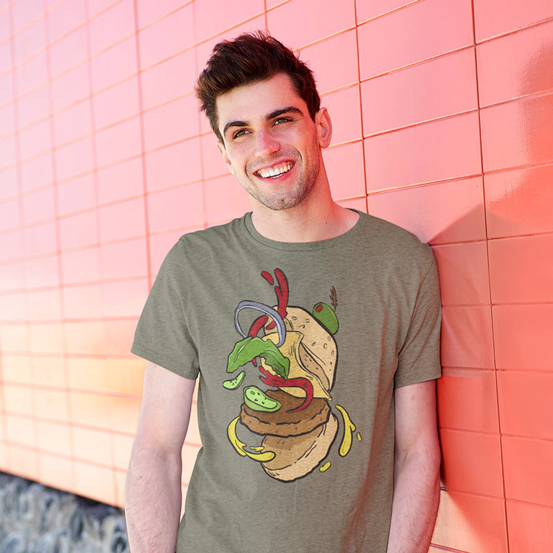 smiling man outside wearing food themed shirts with cheese burger graphic