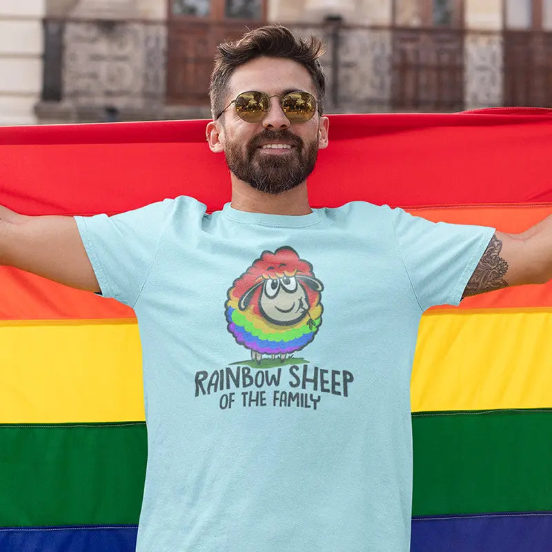 man at pride rally wearing gay pride apparel rainbow sheep of the family t shirt