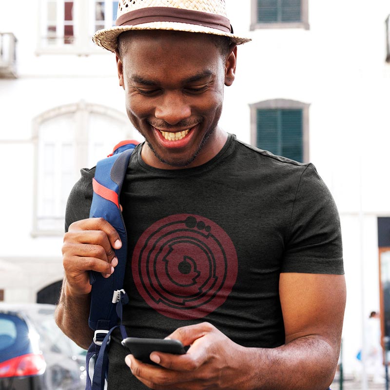 man on cell phone wearing geek shirts with pi geometric graphic on heather charcoal t shirt