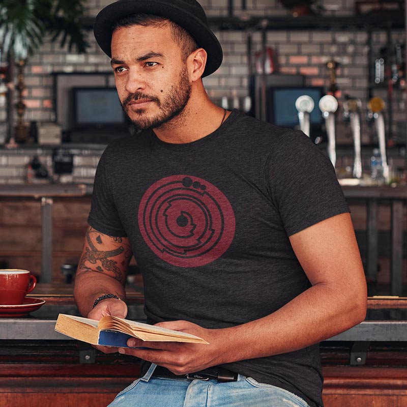 man at bar reading book wearing geek tee with pi graphic in heather charcoal