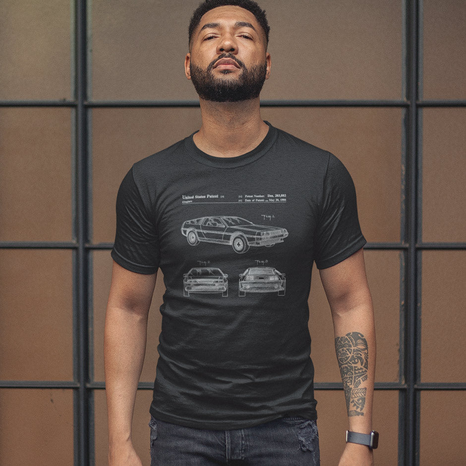 guy wearing the Dodo Tees gifts for car lovers DMC-12 car shirt in black. The automotive shirts feature 3 views of the distinctive car.