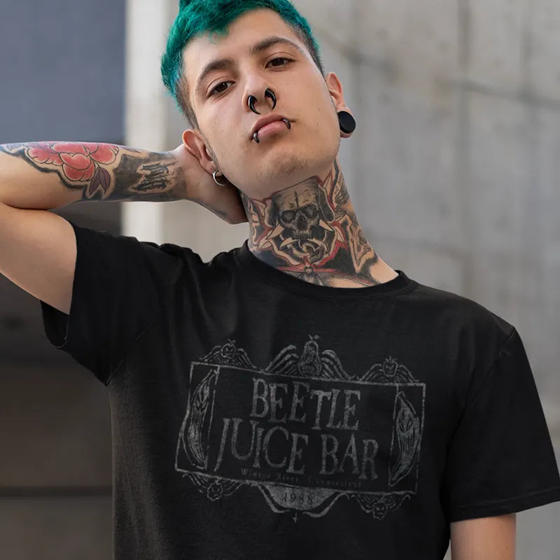 model wearing halloween shirt for adults with beetle juice bar graphic