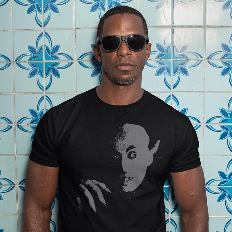 man wearing halloween shirts for adults with nosferatu graphic and sunglasses