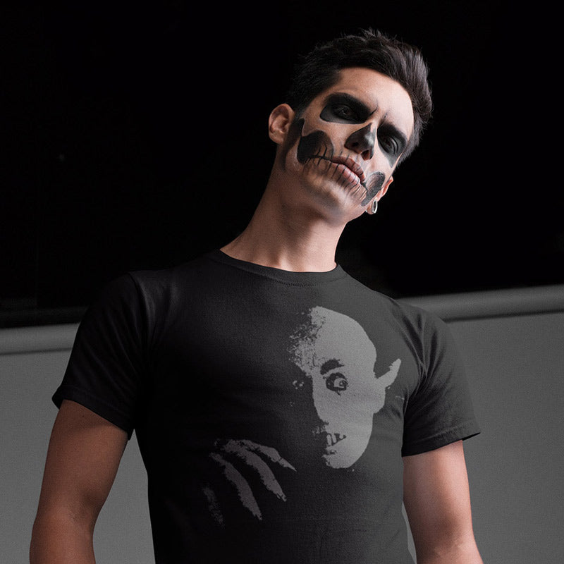 man on halloween wearing halloween shirts for adults with nosferatu graphic and skull face paint