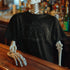 skeleton at bar wearing halloween spirit beetle juice bar shirt